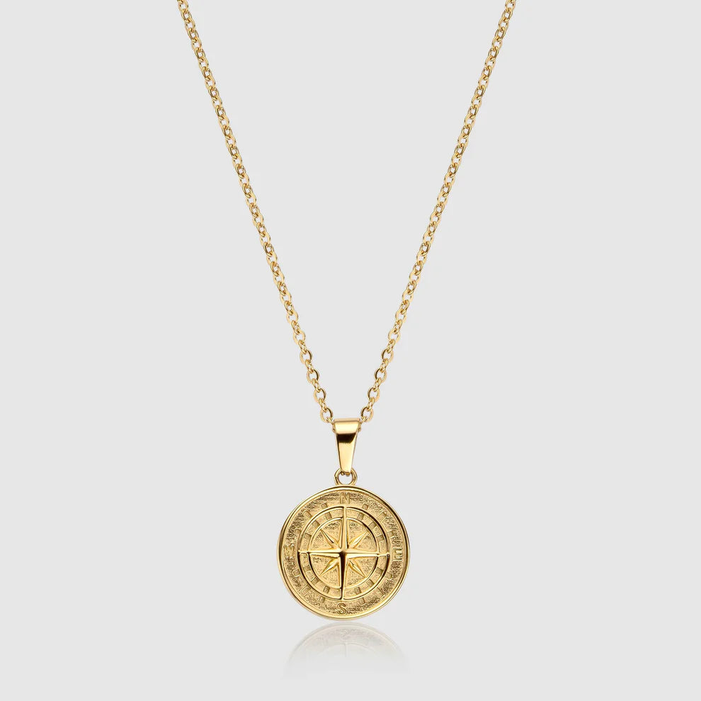 Brújula Oro